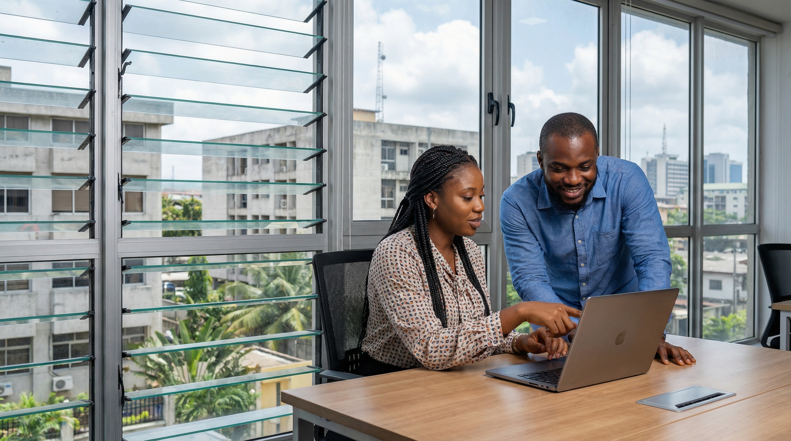 Professional with keys, welcoming gesture. Global connectivity and excellence.